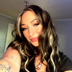 Stylish OnlyFans Model, Sabrina, Posing for a Selfie