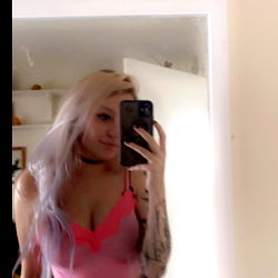 Alice Dee, a vibrant model posing confidently for the camera