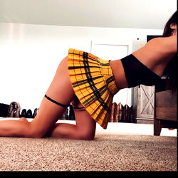 Angie, a Reno, NV OnlyFans Model in Skirt and Bra