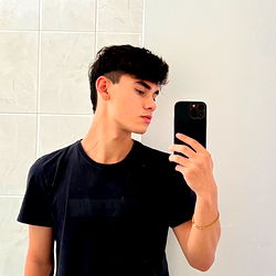 São Paulo-based model Addam showcasing casual look in mirror selfie