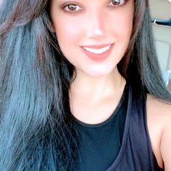 Fitness Model Posing for the Camera