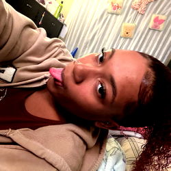 Woman in a Room Taking a Selfie