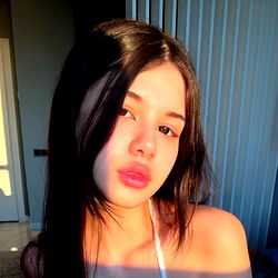 Model Portrait with Sunlit Backdrop