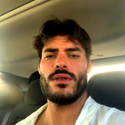 Casually Dressed Man in Car