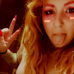 Marge: OnlyFans Model with Red Tattoos and Pink Streaks