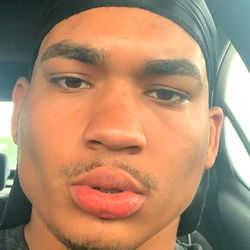 AP, a Young Man in a Black Headband