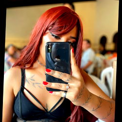 Jhoana G on her phone