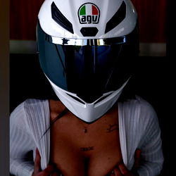 Female Motorcyclist in Helmet