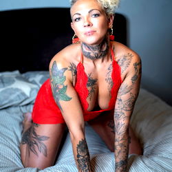 Keza, Tattooed Fitness Model in a Red Dress