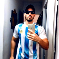 Fan posing with Argentina soccer jersey