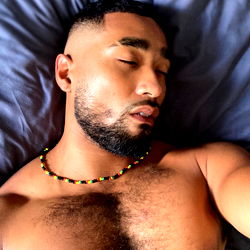 Shirtless Model Taking a Selfie