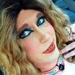 Stylized Model With Eye Makeup and Colorful Lipstick