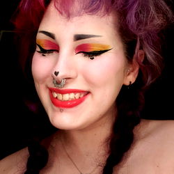 Model Showcasing Aesthetic Makeup and Accessories