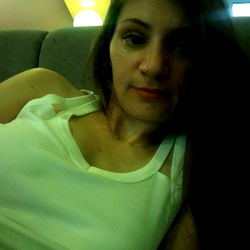 A woman enjoying a moment of relaxation at home