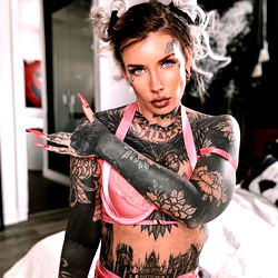 Memphis Mori, a tattooed and styled model from OnlyFans,