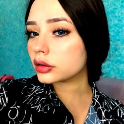 Young Woman with Straight Brown Hair and a Nose Ring