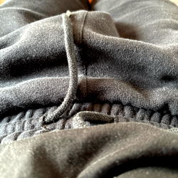 Showing off the waistband of gym shorts