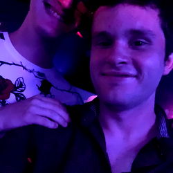 Adonis and Bunny pose for the camera at a party