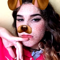 Amy Sinks Posing with Glittering Dog Face Filter