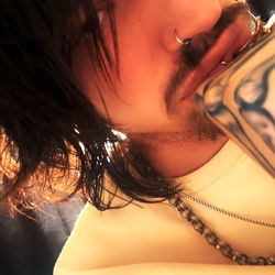 OnlyFans Model with Tattoos and Necklace