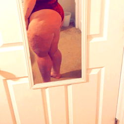 Onlyfans Model AshBaby25 Posing in a Red Bikini