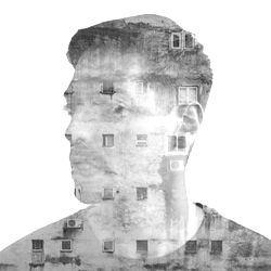 Artistic Blurred Portrait with a House in the Background