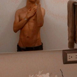 OnlyFans Model RojoD Poses in Bathroom Mirror