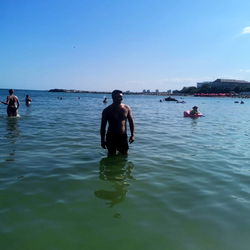Beach Scene with a Man in Water