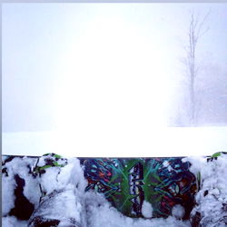 Snowy Mountain Landscape with Snowboard