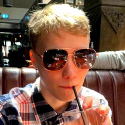 Asi Drinking a Beverage