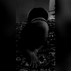 Suey Co in a Bikini, Kneeling and Looking to the Side