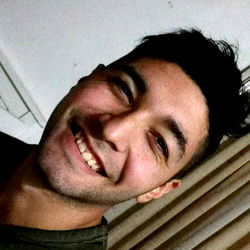 Agustin, Smiling Man with Short Hair