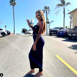 Summer Vibes: Clarissa Poses in a Coastal Town