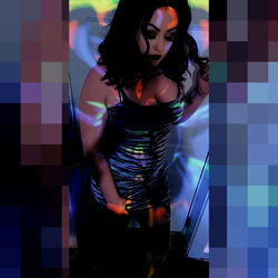 Marie - OnlyFans Model in Tiger Striped Dress Posing for the Camera