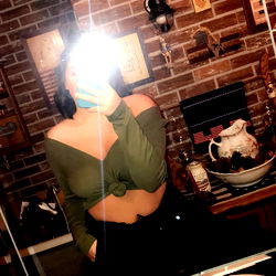 Model Secret Taking a Selfie in the Bathroom