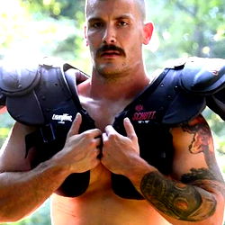 Muscular Man in Football Gear
