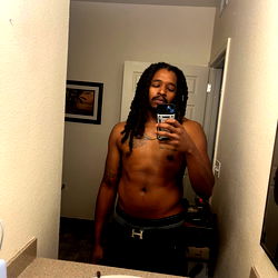 OnlyFans Model Alphaphoto916 in Bathroom Mirror