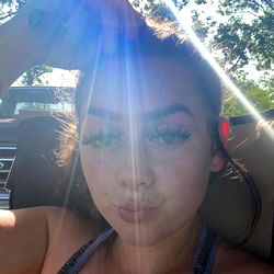 Model in a Sunlit Car