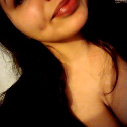 Young Adult Woman Smiling in Selfie