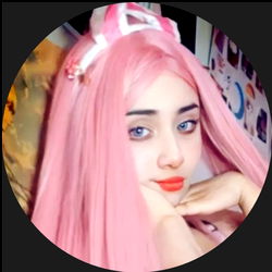 Japanese cosplayer with pink hair and blue eyes