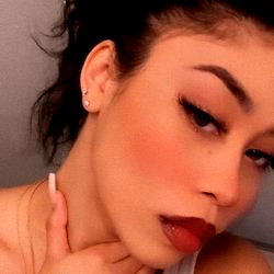 OnlyFans Model Showcasing Striking Makeup and Intense Gaze