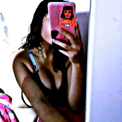 A young woman with her phone, from Quito, Ecuador