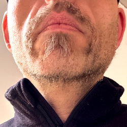 A man with a beard and mustache