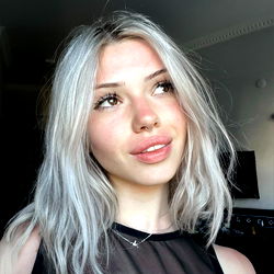 A Woman with Short Hair and a Nose Ring