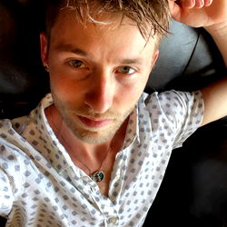 Alex Moore in a casual pose