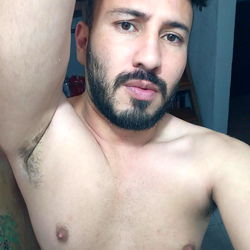 A Shirtless OnlyFans Model Capturing a Moment in His Day