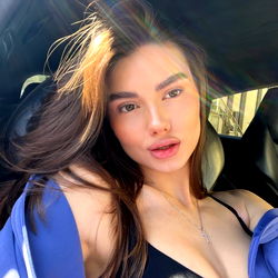 Stylish and Confident Ariel Model Pose for the Camera