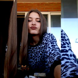 Stylish Female Model with Long Hair Taking Selfie