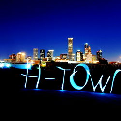 Vivid Night Skyline with City's Name Lit Up