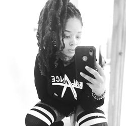 Model Allure in Stylized Photo with Phone